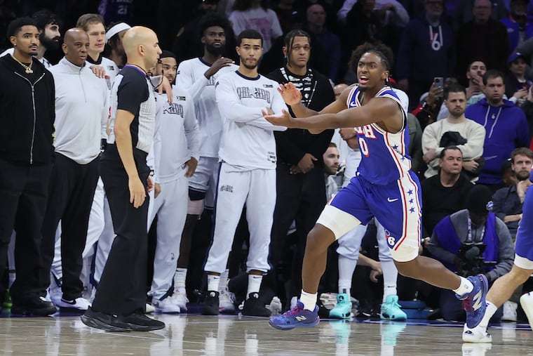Tyrese Maxey of the Sixers questions an official's lack of a foul call on a 3-point shot in the 4th quarter of their game against the Magic at the Wells Fargo Center on Dec. 4, 2024.